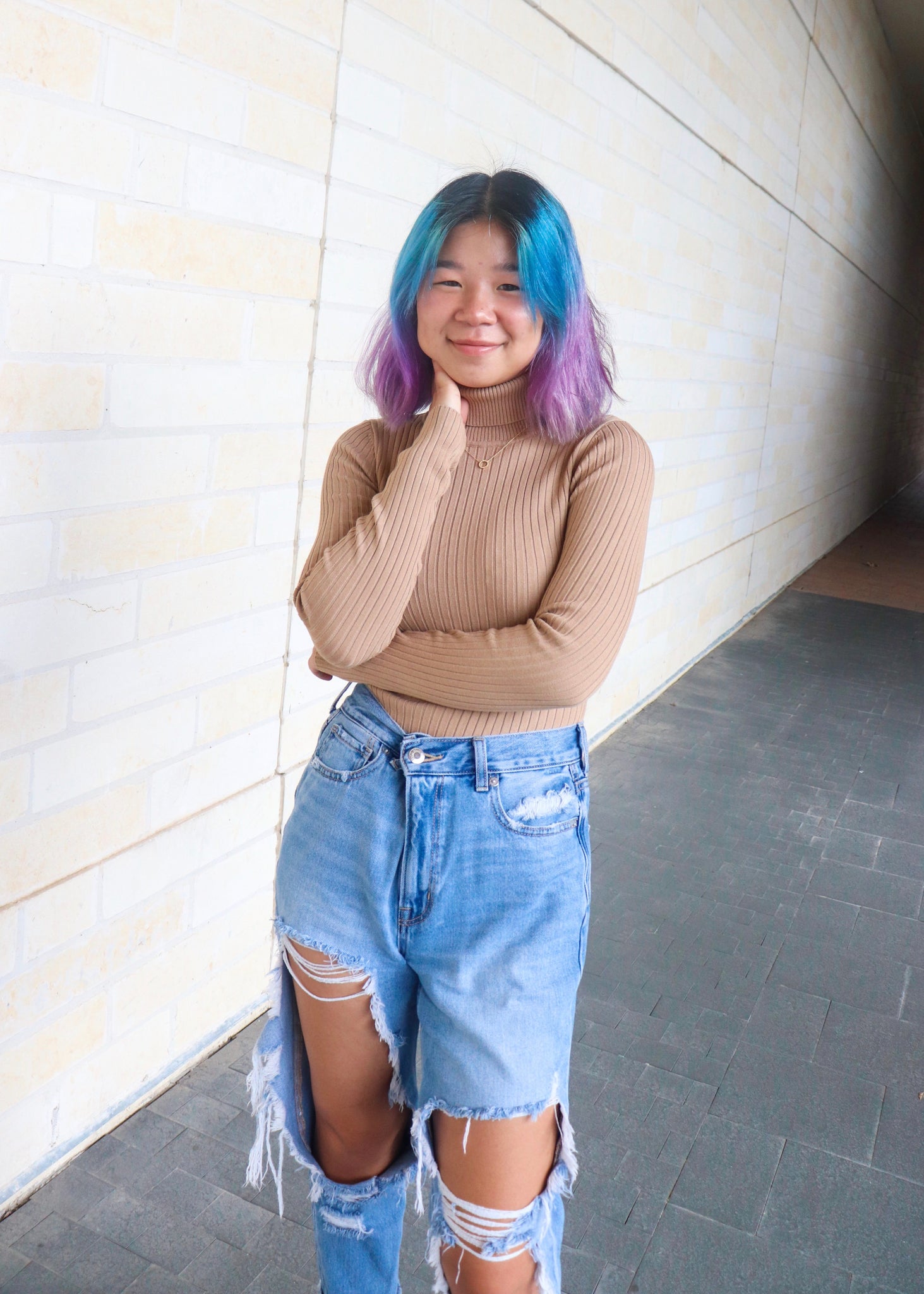 Taupe ribbed bodysuit with a mock turtleneck